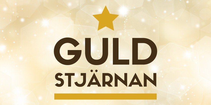 Logotype för guldstjärnan på guldig, glittrig bakgrund.